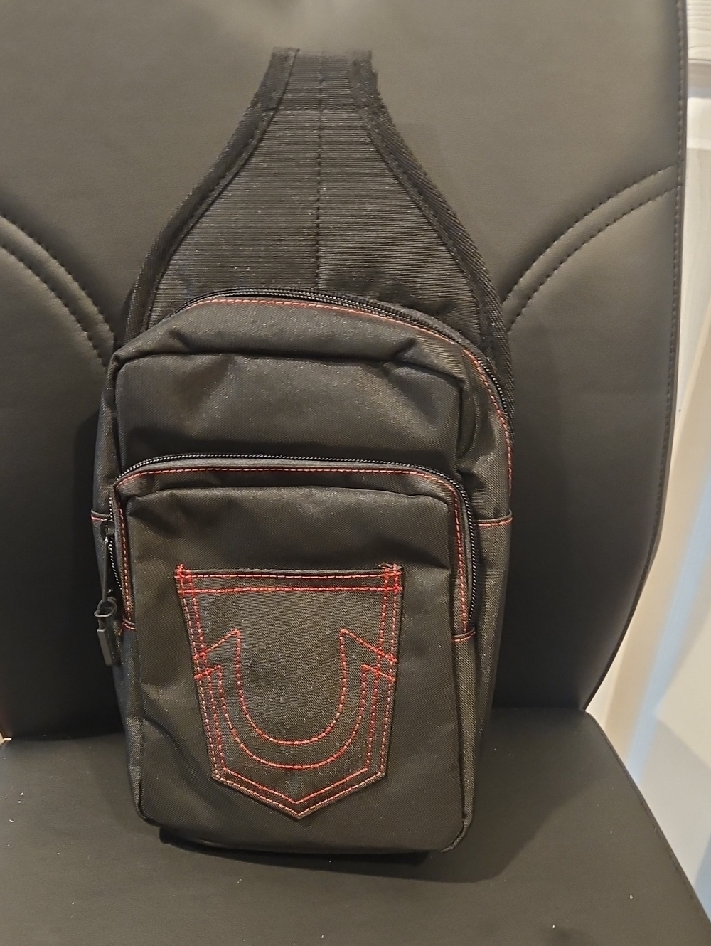 Black Crossbody Sling Bag with Red Stitching